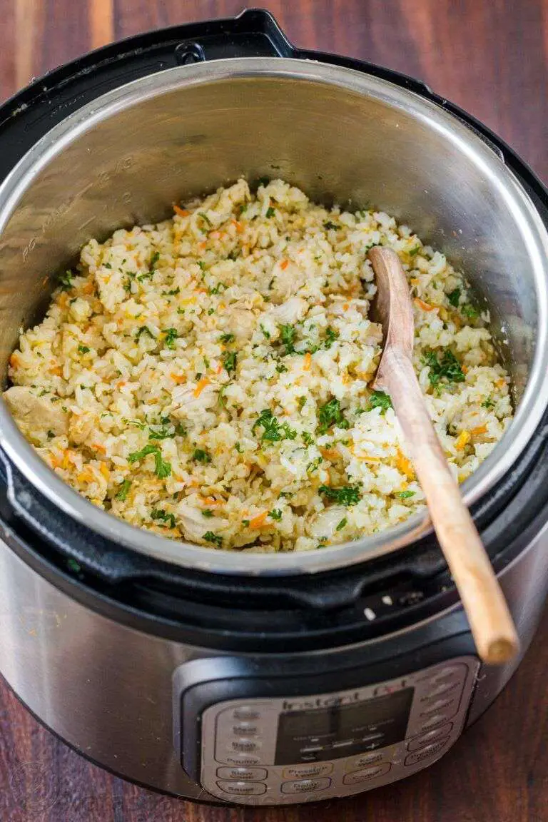 Instant Pot Chicken and Rice is creamy and cheesy with ...