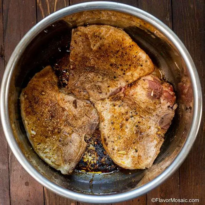 Instant Pot Smothered Pork Chops are tender, juicy, and ...